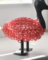 Close up of colourful curly body detail on scrap metal art sculpture