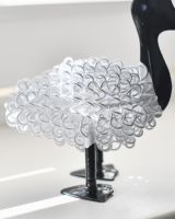 Close up of white body detail on scrap metal art sculpture Close up of white body detail on scrap metal art sculpture