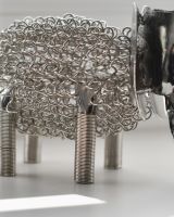 Close up of intricate detail on recycled metal art sculpture 