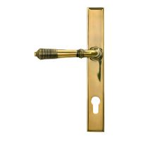 Ribbed Slimline Exterior Door Handle in an Aged Brass Finish From Behind Ribbed Slimline Exterior Door Handle in an Aged Brass Finish From Behind