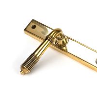 Ribbed Slimline Exterior Door Handle in an Aged Brass Finish Showing a Close up of the Handle Ribbed Slimline Exterior Door Handle in an Aged Brass Finish Showing a Close up of the Handle