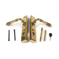 Ribbed Slimline Exterior Door Handle in an Aged Brass Finish Showing Front and Back with Screws Ribbed Slimline Exterior Door Handle in an Aged Brass Finish Showing Front and Back with Screws