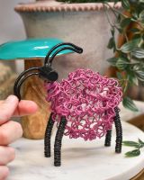 scale of recycled metal art sculpture