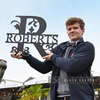 Scale of the Monogram Sign Displaying the Surname Roberts