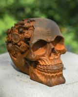 angled view of rustic finish cast iron garden sculpture