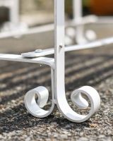 Close-Up of Integral Feet for Robust Cream “Chatham" Park Table Close-Up of Integral Feet for Robust Cream “Chatham" Park Table