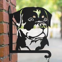 Rottweiler hanging basket bracket in the park