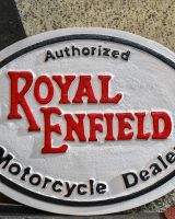 Close up of "Royal Enfield" Cast Iron Automobilia Reproduction Sign finish Close up of "Royal Enfield" Cast Iron Automobilia Reproduction Sign finish