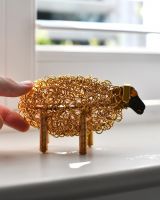 Scale image of recycled metal art sculpture