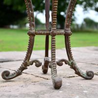 Close up of scroll and embellishments on feet  Close up of scroll and embellishments on feet
