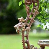 Close up of rustic Victorian Cast Iron Table Stand Close up of rustic Victorian Cast Iron Table Stand