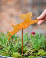 Rustic Bounding Hare Artistic Plant Pot Spike - Set of Two with hand in shot for scale