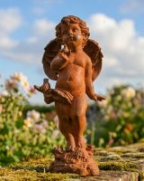 Rustic Cast Iron Cherub with Bird Sculpture Digital Illustration