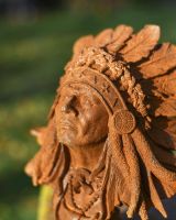 Close-Up of Rustic Cast Iron "Chief" Head Bust Garden Sculpture Close-Up of Rustic Cast Iron "Chief" Head Bust Garden Sculpture