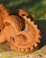 Close-Up of Detailed Cast Iron Sculpture in Rustic Finish