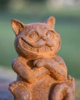 Rustic Cast Iron "Grinning" Cheshire Cat Garden Sculpture in Situ