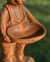 Close up Of Rustic Cast Iron Rabbit Holding Bowl Sculpture & Bird Bath Feeder Bowl For Birds Close up Of Rustic Cast Iron Rabbit Holding Bowl Sculpture & Bird Bath Feeder Bowl For Birds