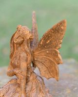 Rustic Cast Iron "Sitting Angel" Garden Sculpture in Situ Rustic Cast Iron "Sitting Angel" Garden Sculpture in Situ