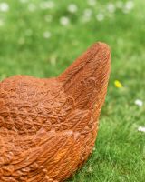 Close up of Rustic Cast Iron Chicken Sculpture tail