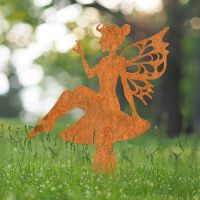 Flower Fairy Sitting on Toad Stool Silhouette in Situ in the Garden Flower Fairy Sitting on Toad Stool Silhouette in Situ in the Garden