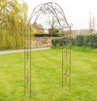 Rustic Fleur De Lys Rose Arch in Situ in the Garden  Rustic Fleur De Lys Rose Arch in Situ in the Garden