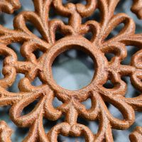 Ornate Design on the Rustic Heavy Duty Cast Iron Round Trivet