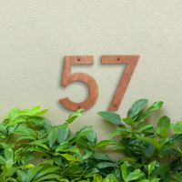Rustic Individual House Numbers on green wall Rustic Individual House Numbers on green wall