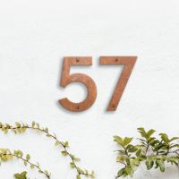 Rustic Individual House Numbers on white wall Rustic Individual House Numbers on white wall