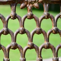 Close up of rustic cast iron back rest 