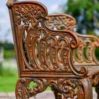 Side view of Rustic Ornate Cast Iron Garden Bench 