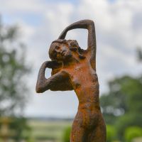 Close-up of the Detail on the Lady Standing on Clam Sculpture