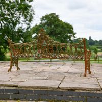Rear view of Rustic Cast Iron Gothic Three Seater Bench