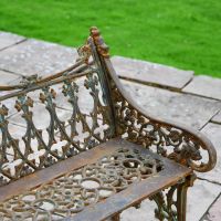 Close up of Rustic Gothic Three Seater Bench