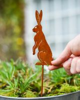 Rustic Watchful Hare Artistic Plant Pot Spike - Set of Two with hand in shot for scale