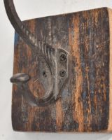 Dark Rustic Wood And Iron Coat Hook up close of hook Dark Rustic Wood And Iron Coat Hook up close of hook