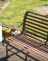 Situ Shot of Rustic Wrought Iron “Chatham" Two Seater Garden Bench