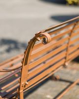 Close-Up of Back of Rustic Wrought Iron “Chatham" Two Seater Garden Bench
