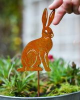 Rusting Sitting Hare Artistic Plant Pot Spike - Set of Two with hand in shot for scale