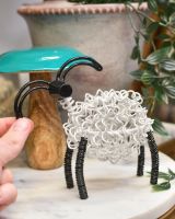 Scale image of recycled metal art sculpture