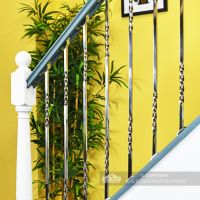 Chrome Stair Spindles fitted in staircase Chrome Stair Spindles fitted in staircase