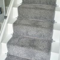 Close-up of the Ball Finial Bright Chrome Stair Rods in Use