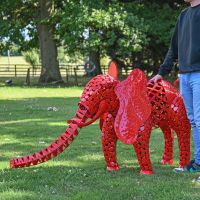 "Sambaku" Red Garden Elephant Sculpture to Scale "Sambaku" Red Garden Elephant Sculpture to Scale