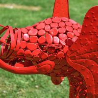 Close-up of the Detail on the Face of the "Sambaku" Red Garden Elephant Sculpture 