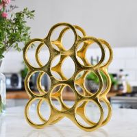 "Floating Bubbles" Wine Rack in Gold Finish 