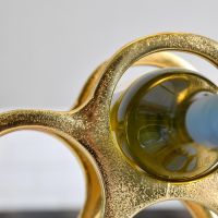 Close up of wine bottle in holder 