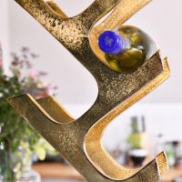 Close up of gold finish on "Art Deco" Wine Rack 