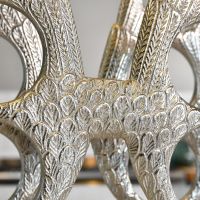 Close up of detailing on "Angel Wings" Wine Rack 