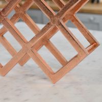Close up of "Geometric" Copper Wine Rack 