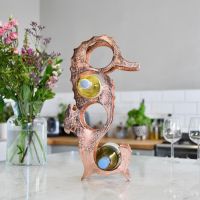"Seahorse" Wine Rack in Copper Finish on Kitchen Countertop 