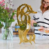Gold "Seahorse" Wine Rack on Kitchen Counter 
